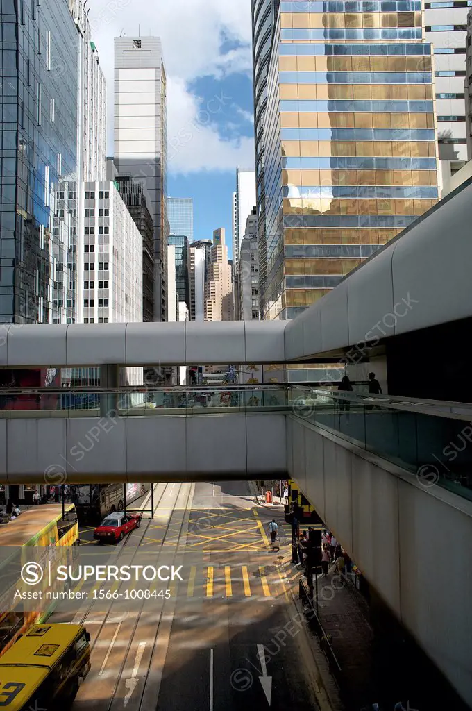 elevated view of intersection in downtown Central district, Hong Kong, with buses and taxi