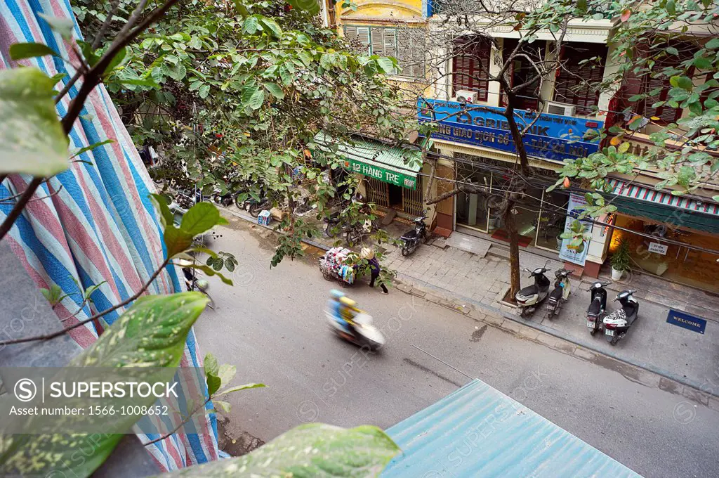Looking down onto the streets of Vietnam from a second story window