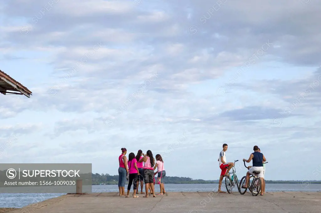 Teenagers gathers together at the end o the day in Bocas Town, Isla Colon, Bocas del Toro, Panama