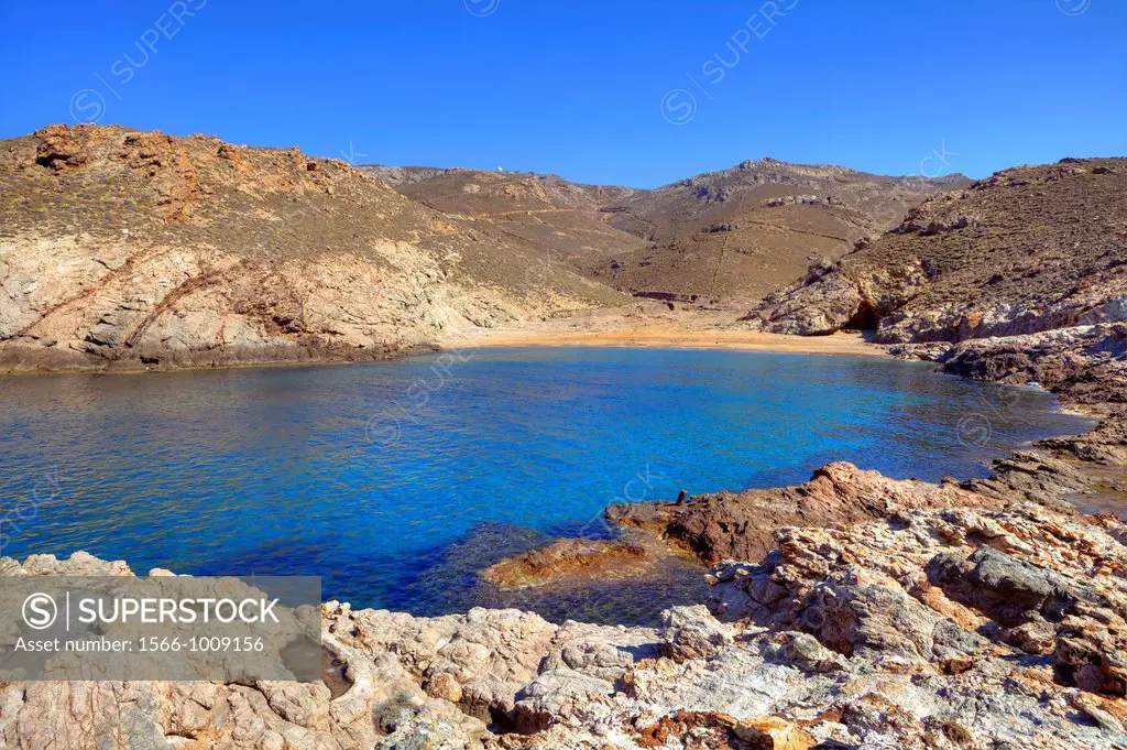 secluded bays with crystal clear water and shale in the north-east of Mykonos, Greece