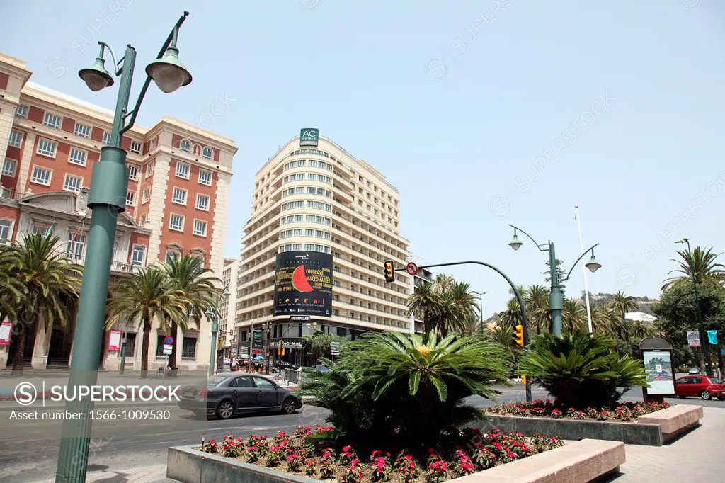 Paseo Park with an overview of the Malaga Palacio hotel, Malaga, Andalucia, Spain