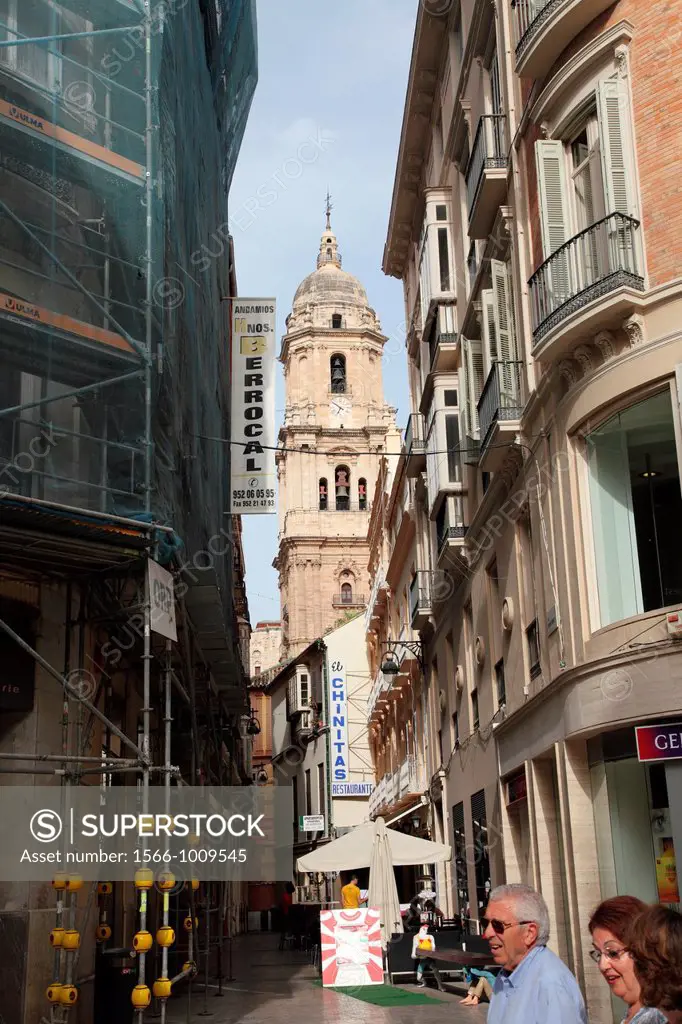 View of the tower of the Cathedral from Calle Larios, Malaga, Andalucia, Spain