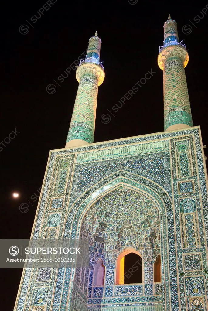 Jameh Mosque of Yazd illuminated at nighttime, Iran