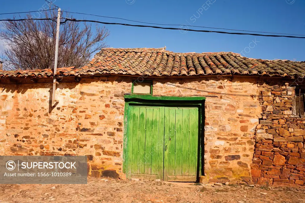 Green door in Castrillo De Los Polvazares, Way Of St  James, León province, Castille and León, Spain