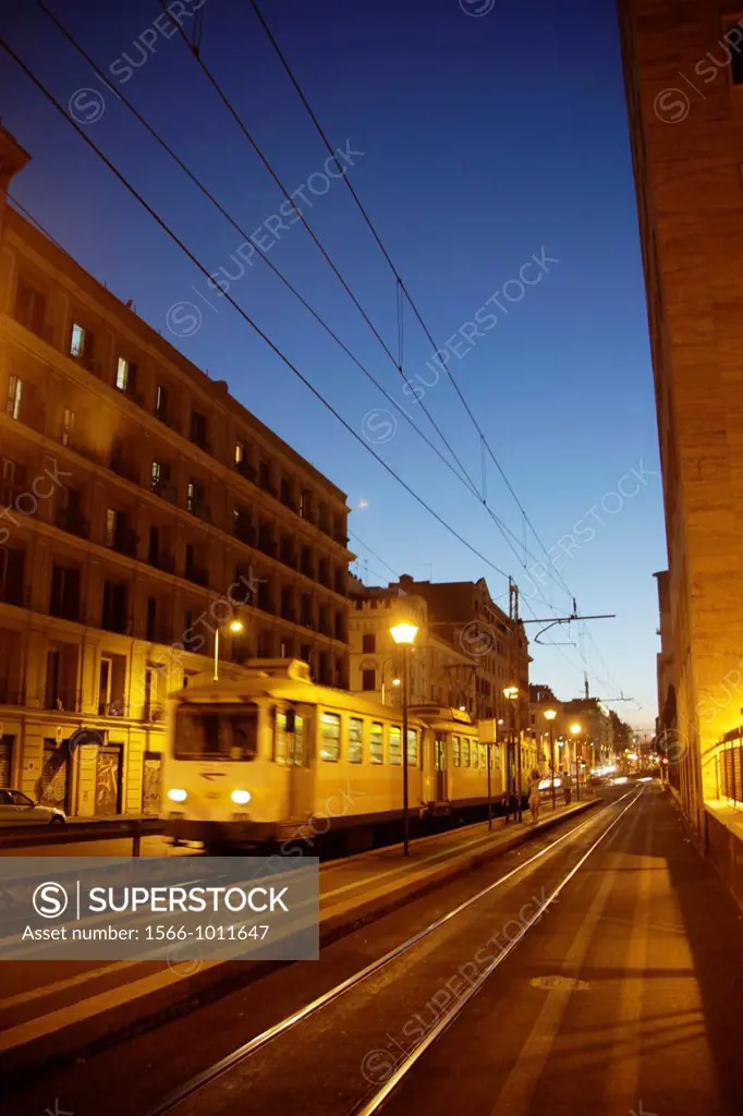 fast tram train at night in rome italy