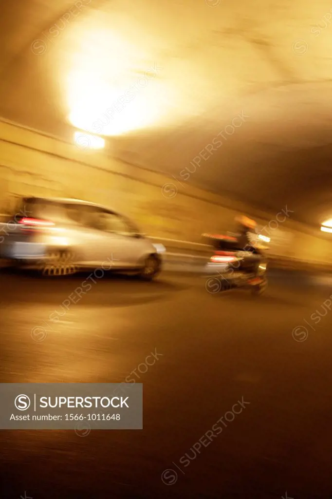 fast car in tunnel at night
