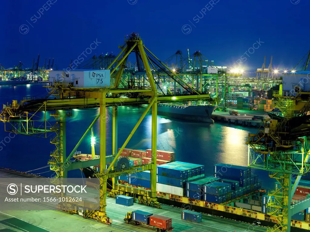 Night view of the Port of Singapore Authority PSA in Singapore  PSA Singapore Terminals is the worlds largest container transhipment hub, handling ab...