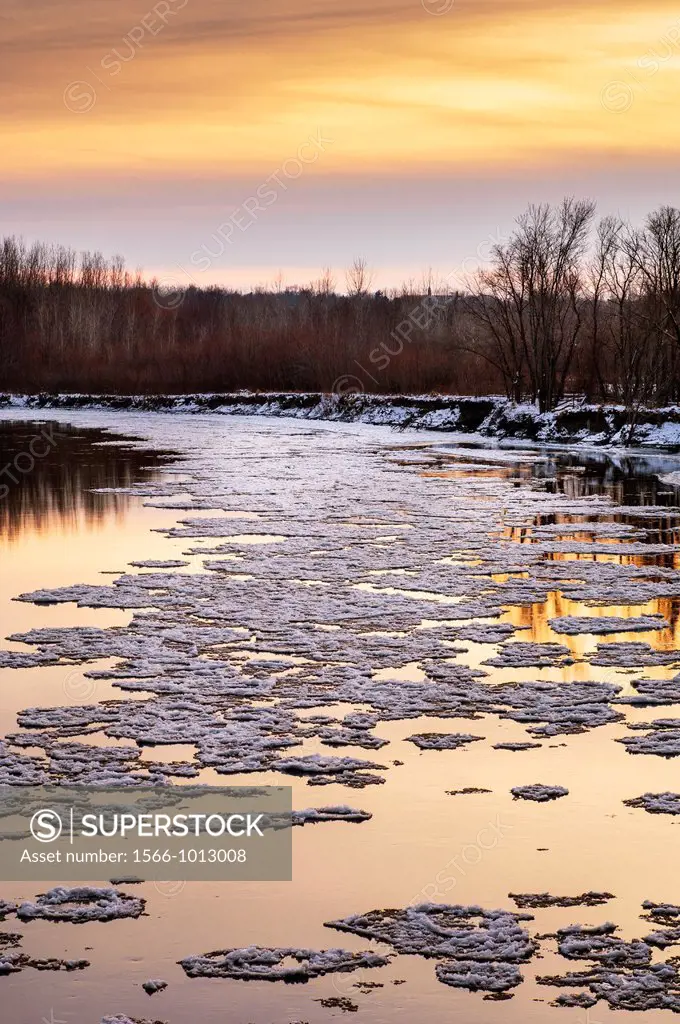 Spring ice flow on the Minnesota River at sunset  The Minnesota River, a tributary of the Mississippi River, flows through the Minnesota Valley River ...