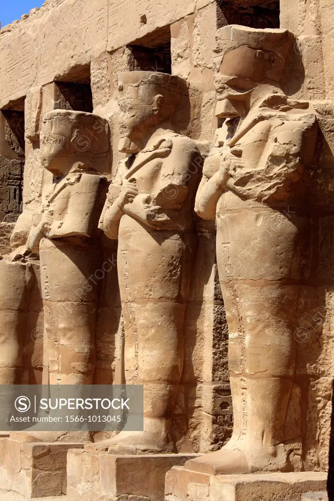 Osirian statues at temple of Pharaoh Ramses III, Karnak Temple Complex, Luxor, Egypt