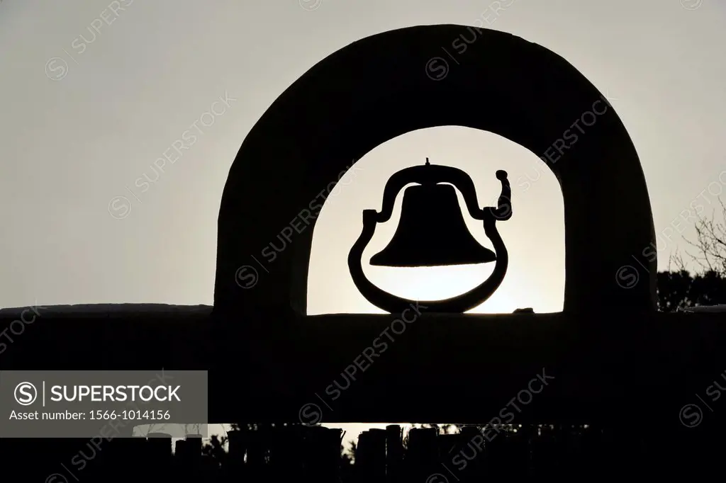 Mission bell on a residential wall, Santa Fe, New Mexico, USA