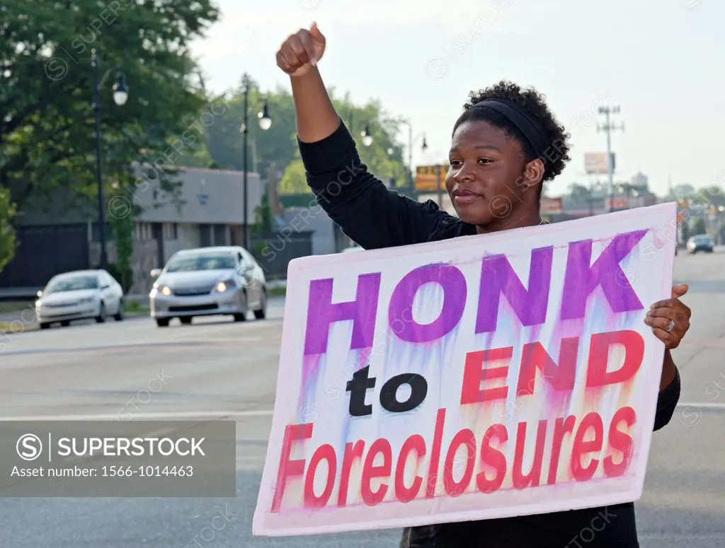 Detroit, Michigan - Neighbors hold a vigil on a street corner outside Jennifer Britt´s home, hoping to block the planned eviction of her family  Britt...