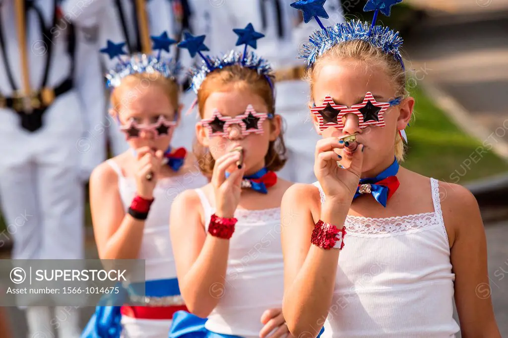 Young members of Uncle Sam´s Band play their kazoo´s during the annual I´On Community Independence Day Parade on July 4, 2012 in Mt Pleasant, South Ca...