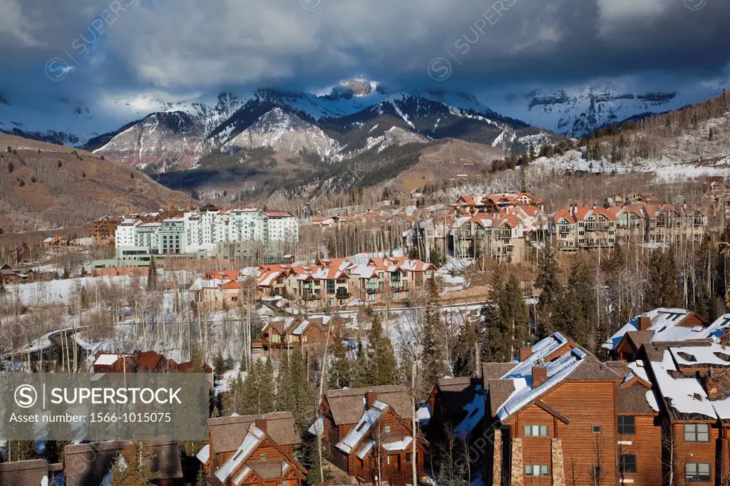 USA, Colorado, Telluride, elevated view of Mountain Village Ski Area and The Peaks Resort, late afternoon