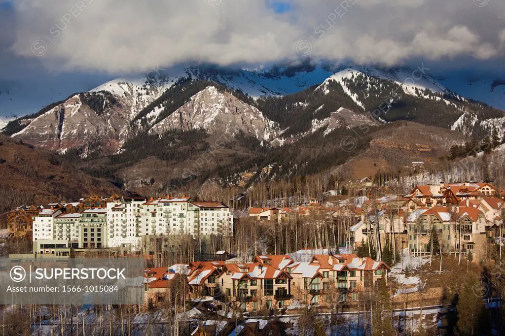 USA, Colorado, Telluride, elevated view of Mountain Village Ski Area and The Peaks Resort, late afternoon