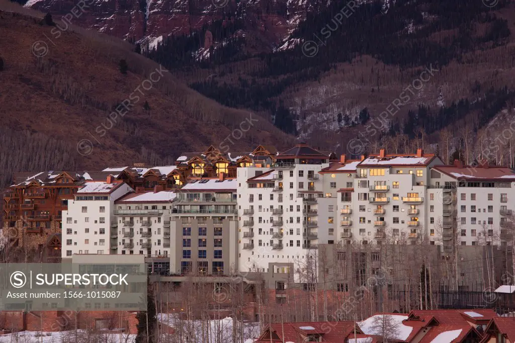 USA, Colorado, Telluride, elevated view of Mountain Village Ski Area and The Peaks Resort, dusk
