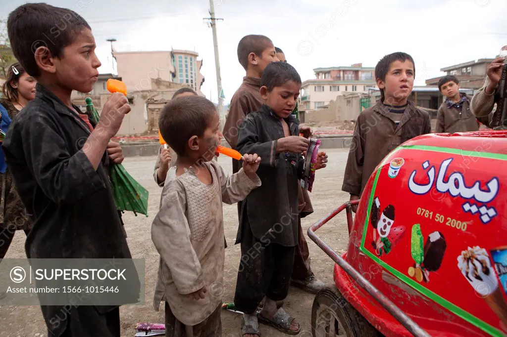 Afghan children at a icecream seller in kabul