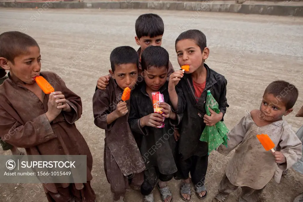 Afghan children at a icecream seller in kabul