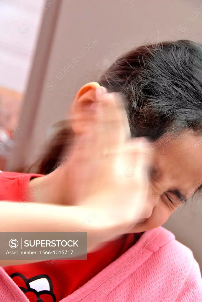 Child abuse  Young girl being slapped on the side of her head