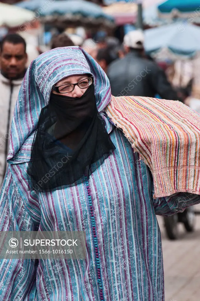 woman in burqa in Marrakech, Morocco