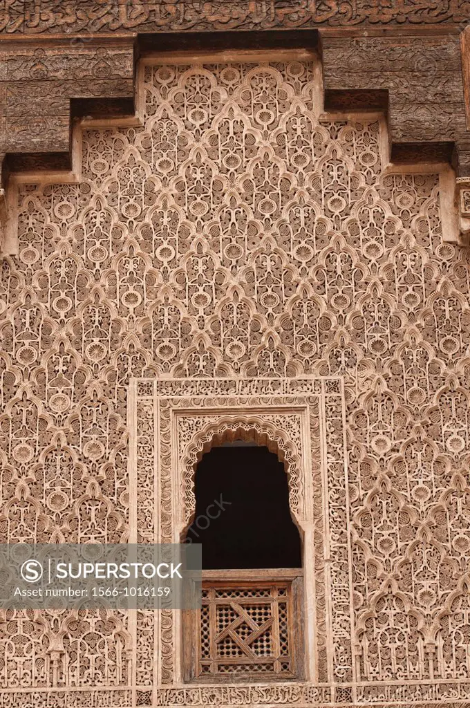 intricate design on the Ali ben Youssef Medersa in Marrakech, Morocco