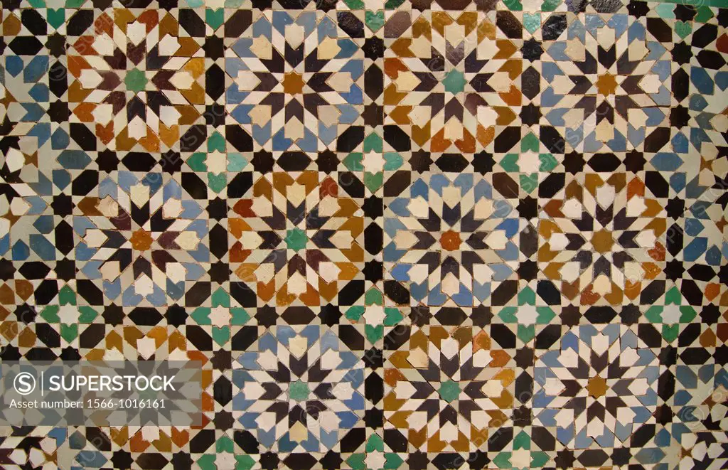 intricate tile design on the Ali ben Youssef Medersa in Marrakech, Morocco