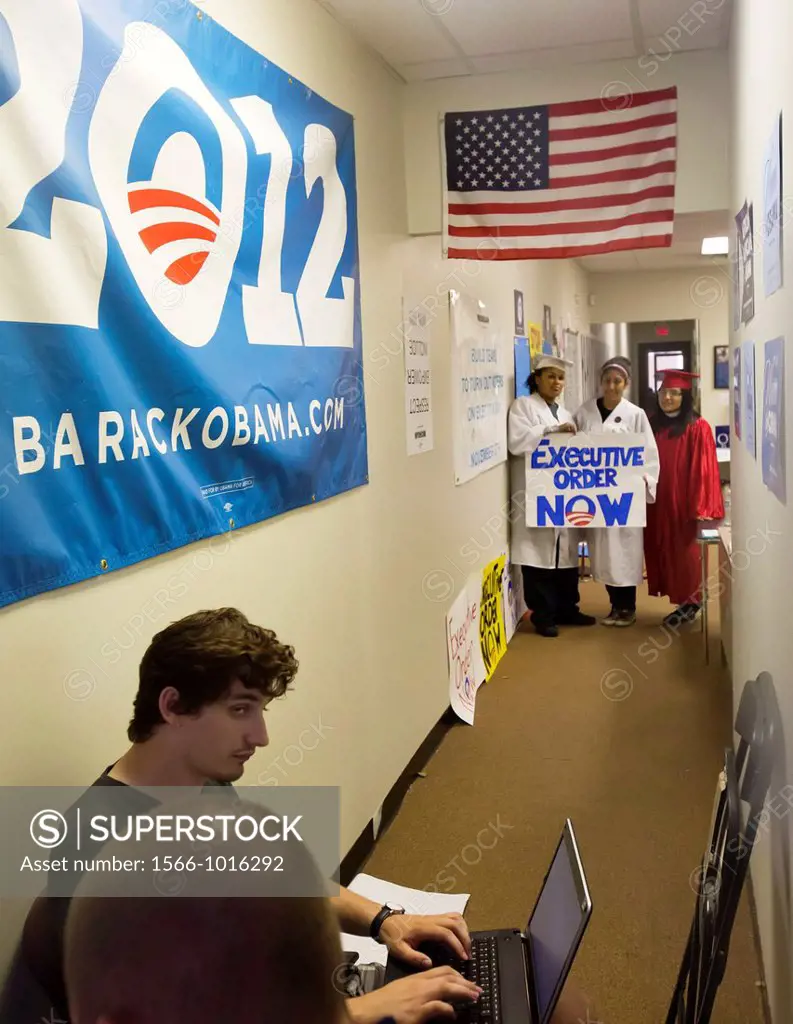 Dearborn, Michigan - Supporters of the DREAM Act occupy the Obama re-election office, urging the President to issue an executive order to stop the dep...