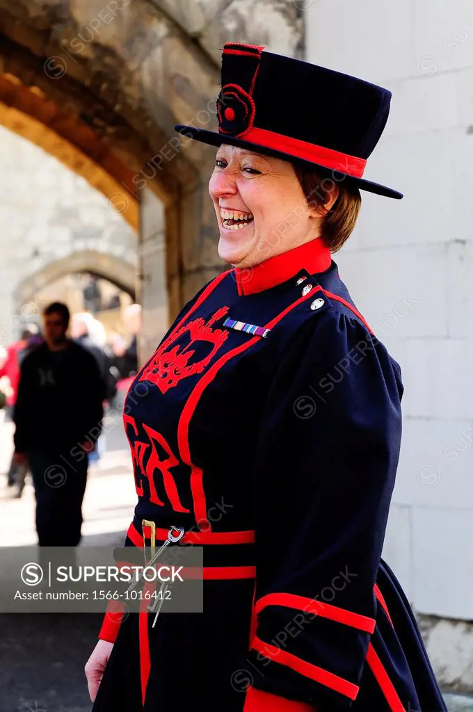 Moira Cameron, the Tower of London´s first female Beefeater at entrance of London Tower, London, England, UK, Europe.