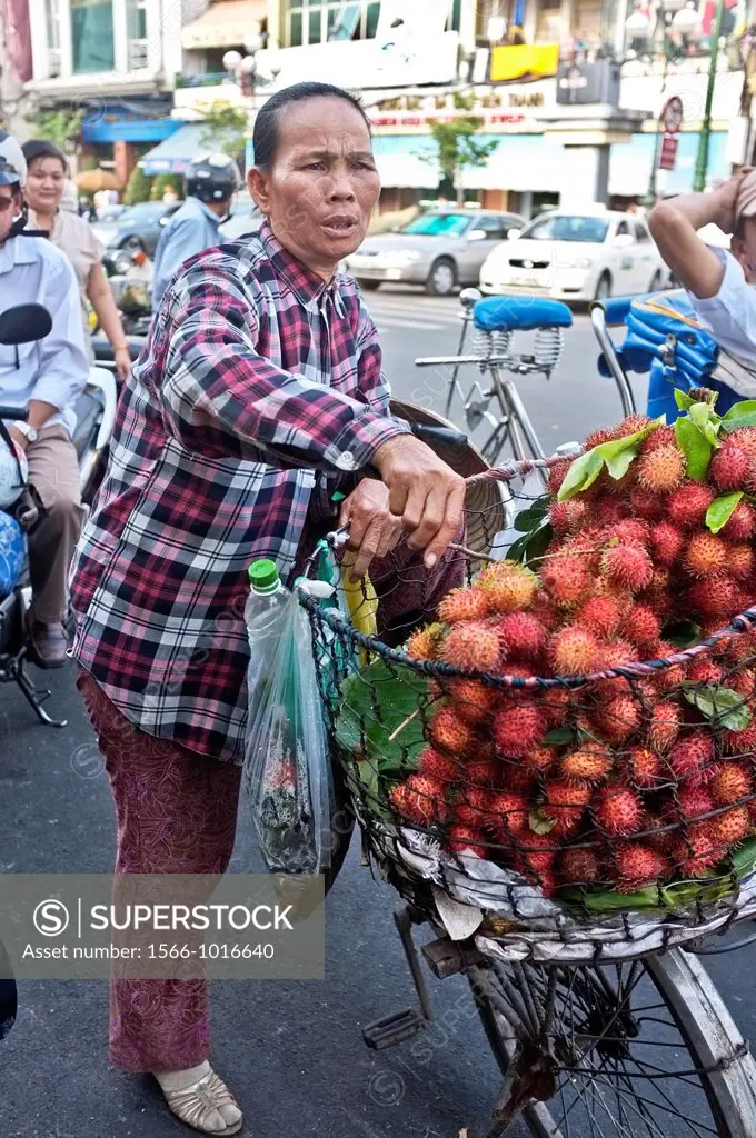 Rambutan fruits street merchant, Ho Chi Minh City, Vietnam