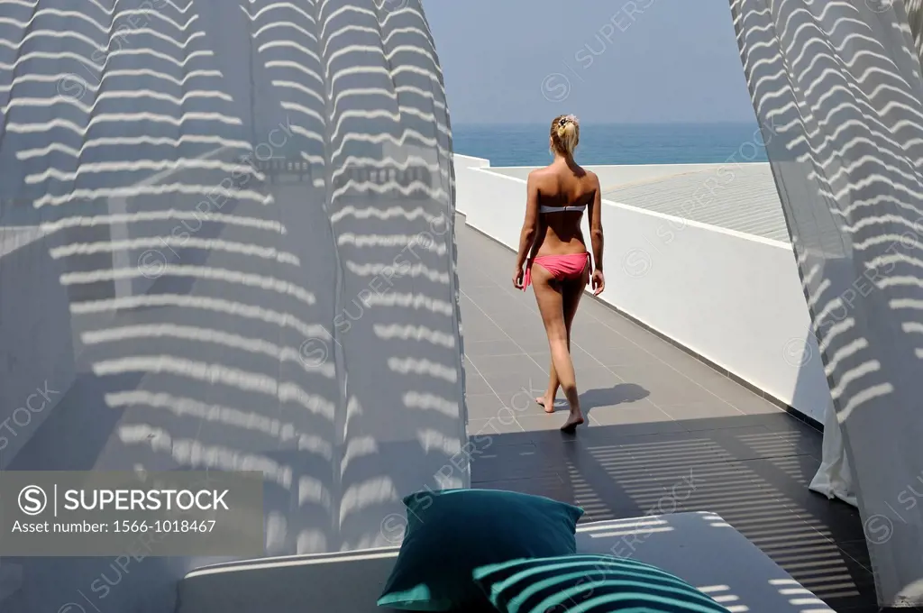 young woman on the spa terrace of the Almyra Luxury Spa Hotel, Paphos, Cyprus, Eastern Mediterranean Sea
