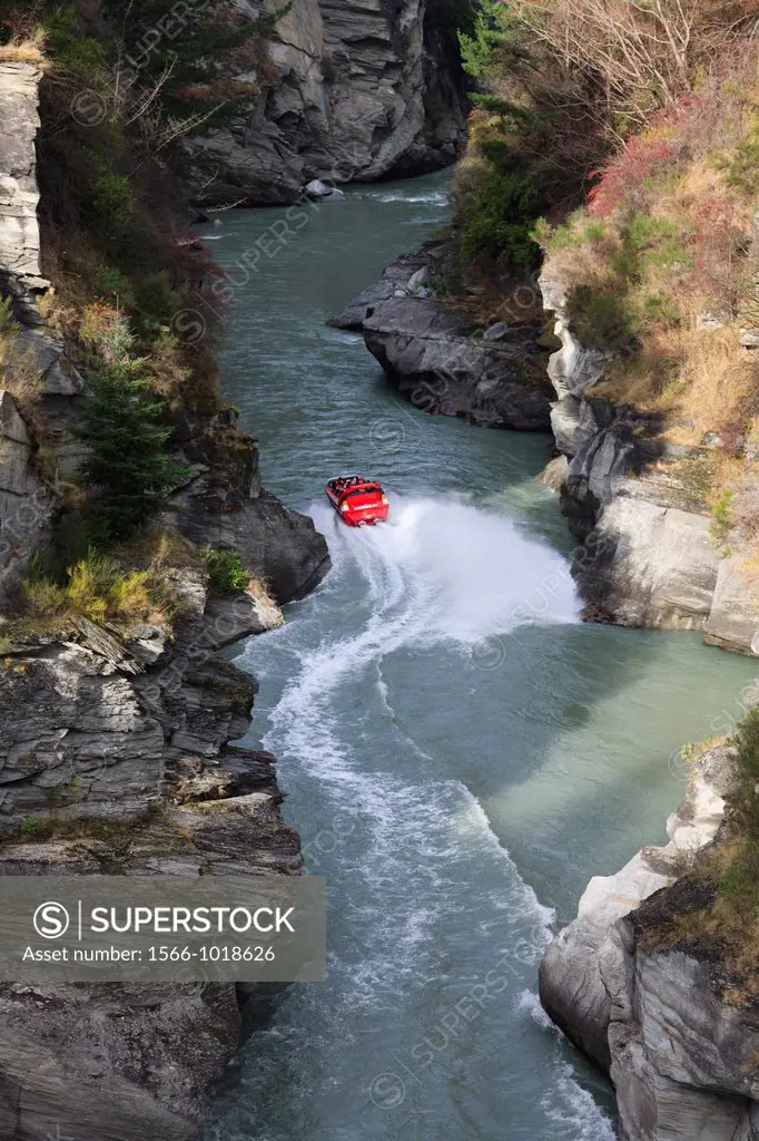 Arthurs Point Queenstown South Island New Zealand  View down into the Shotover River canyon with jet boat giving rides