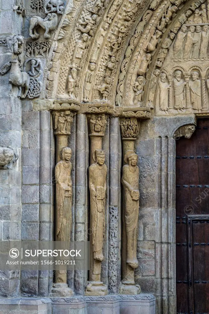 Columns depicting figures of Maria Magdalena, Virgen Maria and Maria mother of Santiago and Juán. Detail of main portal of Romanesque Church Santa Mar...