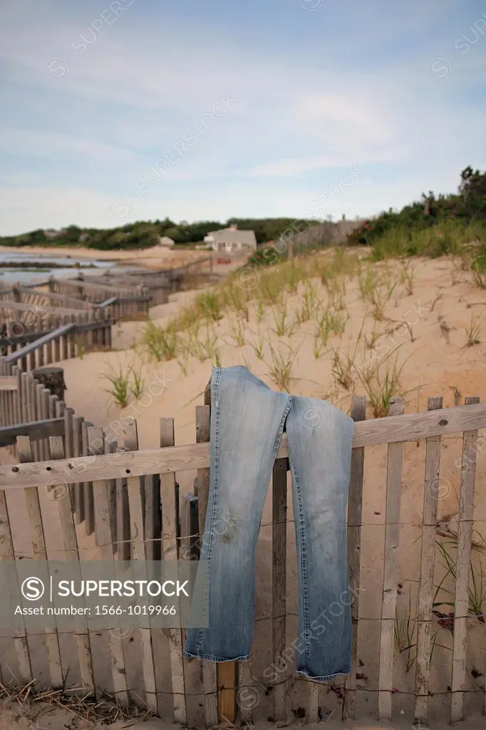 Jeans drying on a fence on Breakwater Beach, Brewster, Cape Cod, Massachusetts