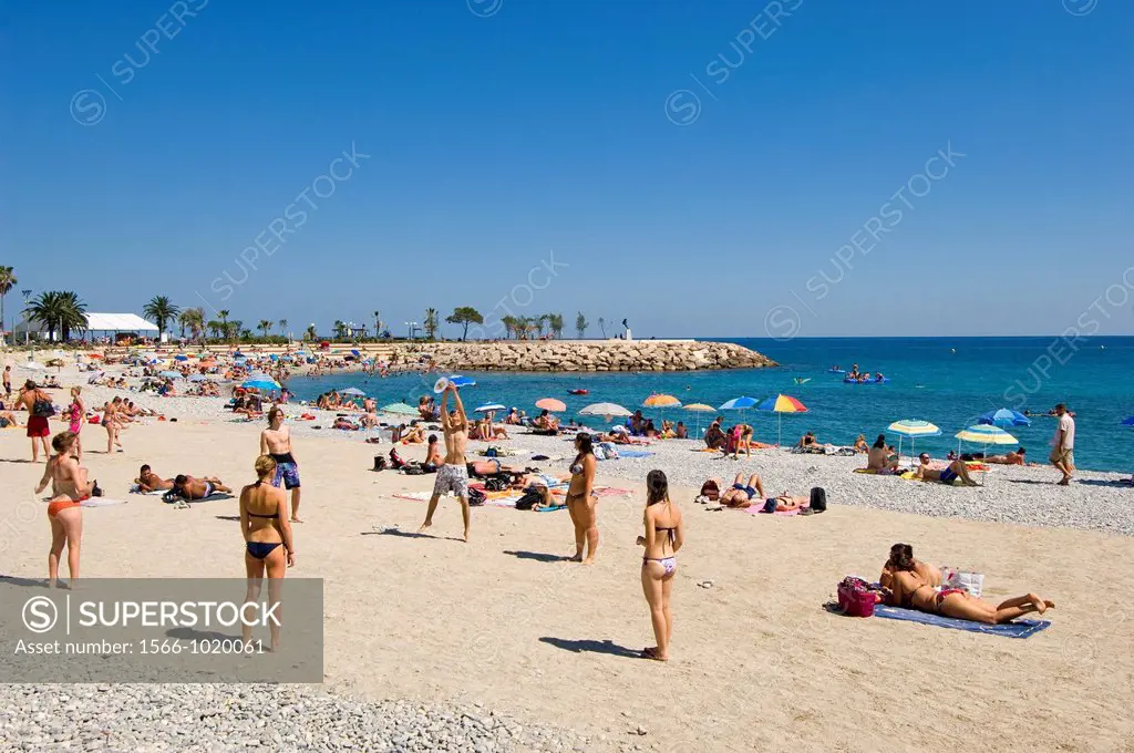Menton, South of France, Summer holiday at the beach, Families relaxing, Young people playing