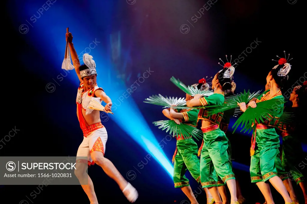 Colorful dance and music show performing on stage at Sarawak Borneo Convention Center, Kuching, Sarawak, Malaysia, Borneo.