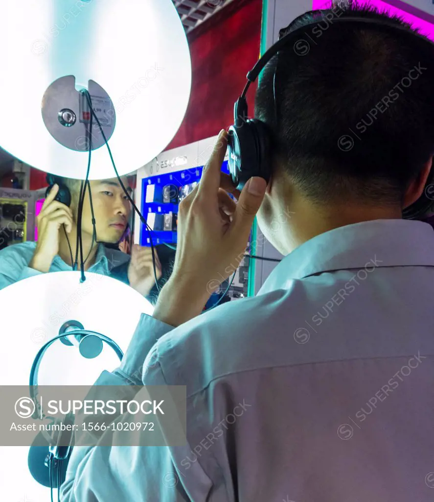 Paris, France, Young Chinese Man Shopping inside Virgin Megastore, Media Technology,Listening to Music on Headphones on Display, on the Avenue Champs ...