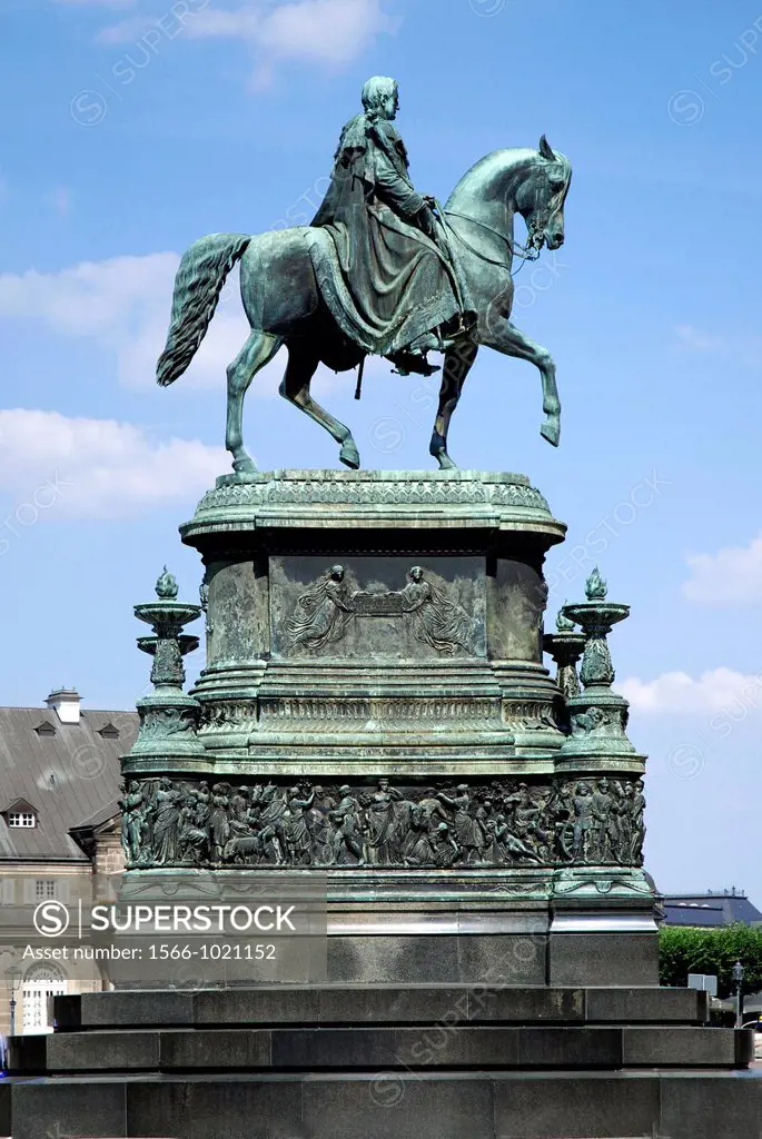 Equestrian statue of the saxon King Johann in front of the opera house Semperoper on Theatre square in Dresden - Caution: For the editorial use only  ...