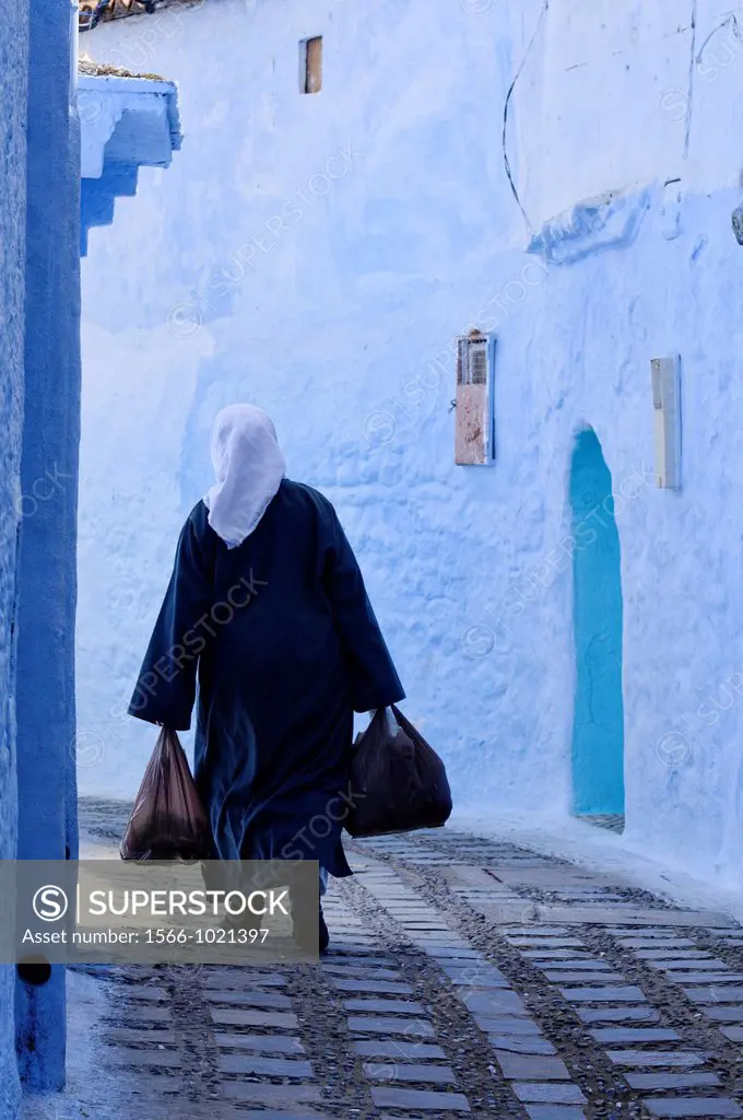 street scene in the atmospheric blue town of Chefchaouen, Morocco