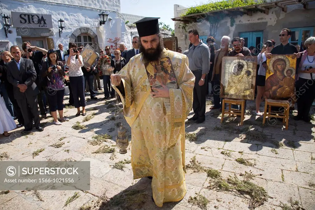 europe, greece, dodecanese, patmos island, chora, orthodox easter time, procession of the icons, aromatic myrrh on the floor, monks