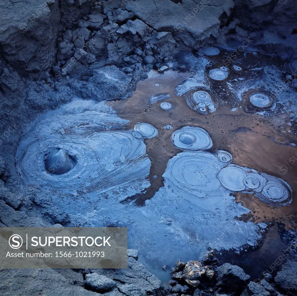 Boiling mud pots, Namaskard, Iceland Namaskard is an area of geothermal activity underground in the earth, with sulphur pools, steam vents and mud poo...