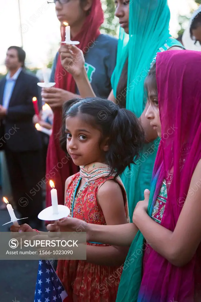 Plymouth, Michigan - Hundreds of Detroit-area Sikhs held a memorial service and candlelight vigil at the Hidden Falls Gurdwara temple for victims of t...