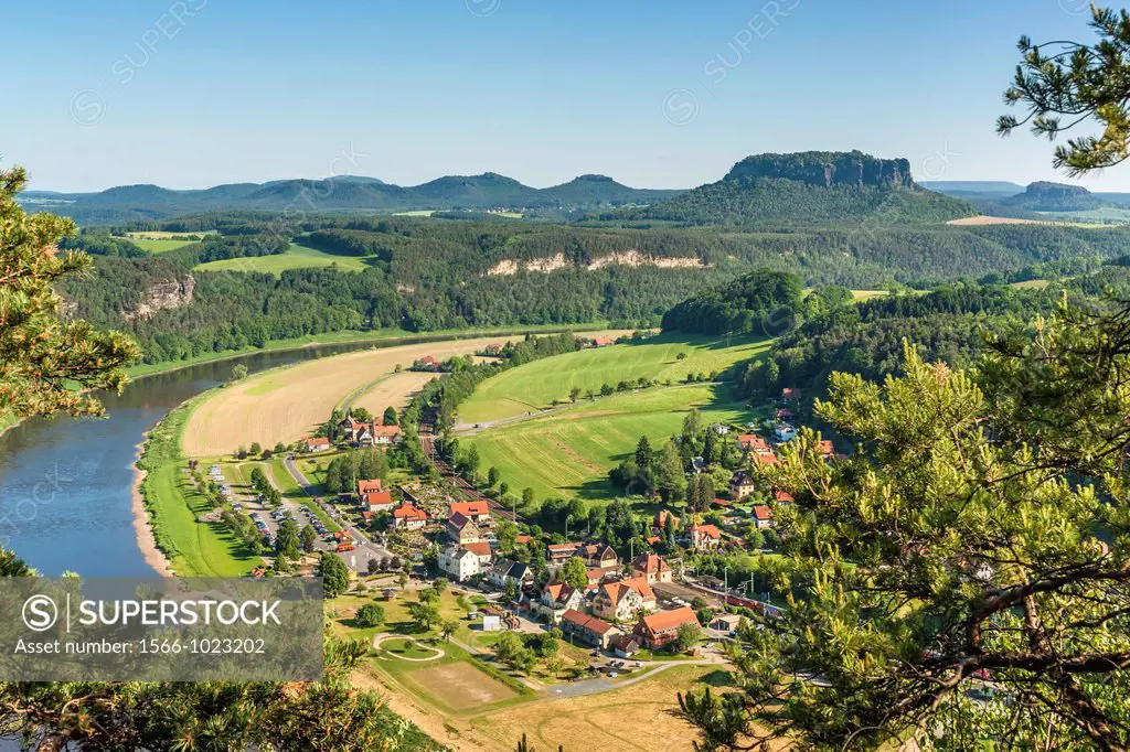 View from the spectacular rock formation Bastei Bastion to health resort Rathen Oberrathen and the Elbe River The Bastei is one of the most visited to...