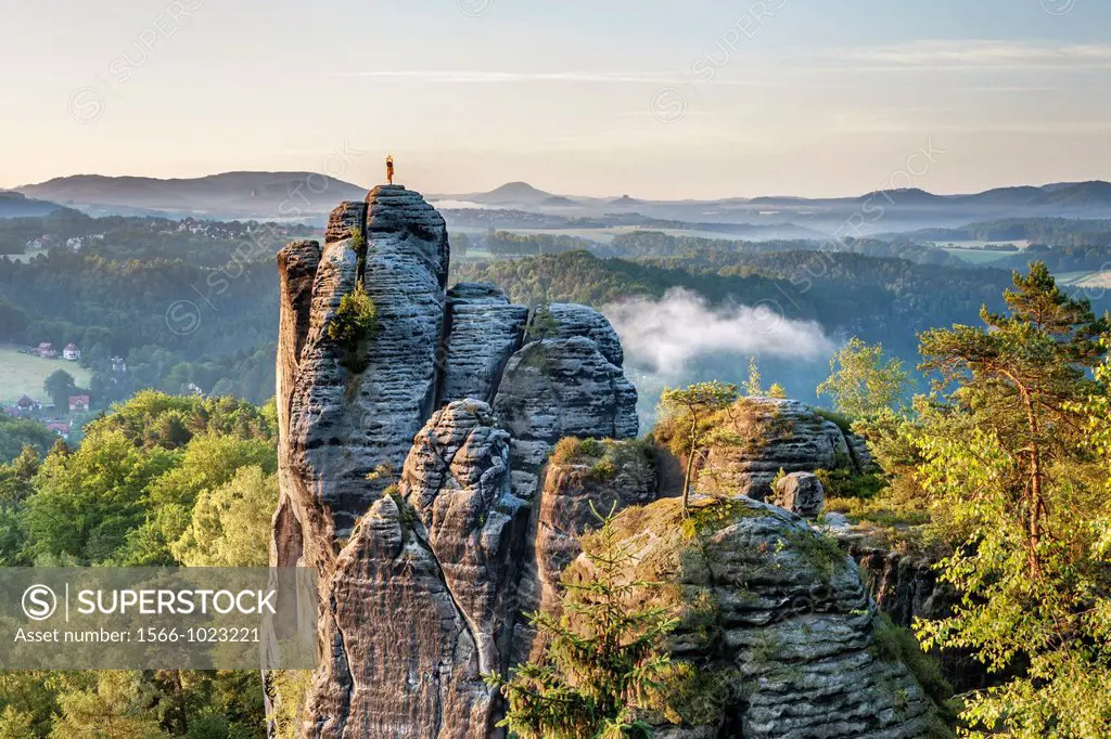 View to the rock Moench also Moenchstein monk or monkstone The Moench is a popular climbing tower rock in the National Park Saxon Switzerland near the...