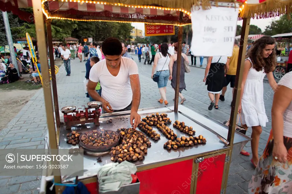 street vendor selling walnuts, islamabad