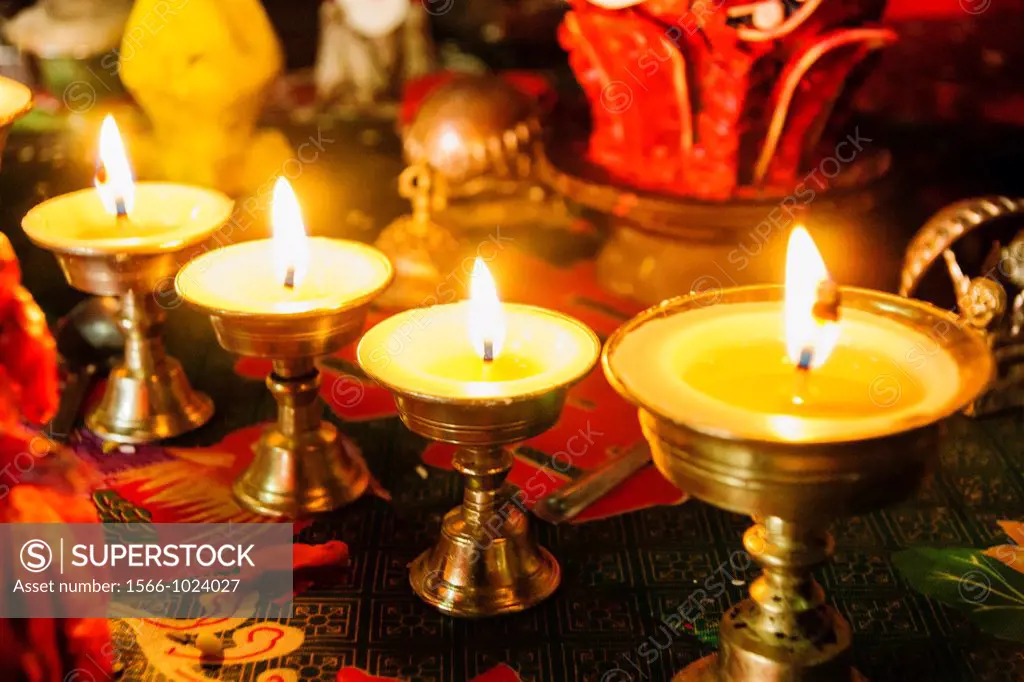 votive candles, Buddhist nunnery, Dengboche, Sagarmatha National Park, Khumbu Himal, Nepal, Asia