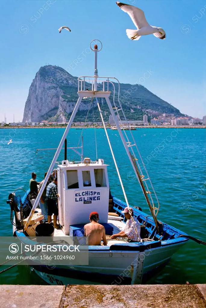 Fishing boat and Rock of Gibraltar, La Linea de la Concepcion, Cadiz-province, Spain        