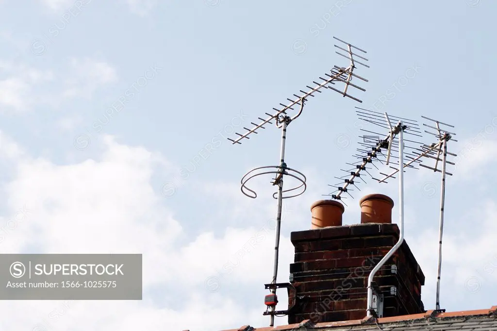 TV aerials on chimney breast of house in Worksop, Nottinghamshire, England