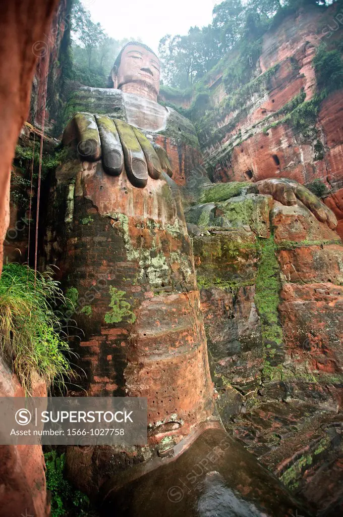 The Leshan Giant Buddha, which at 71 m or 233 ft is the largest stone Buddha in the world, Leshan, Sichuan Province, Dadu river a tributary of the Yan...