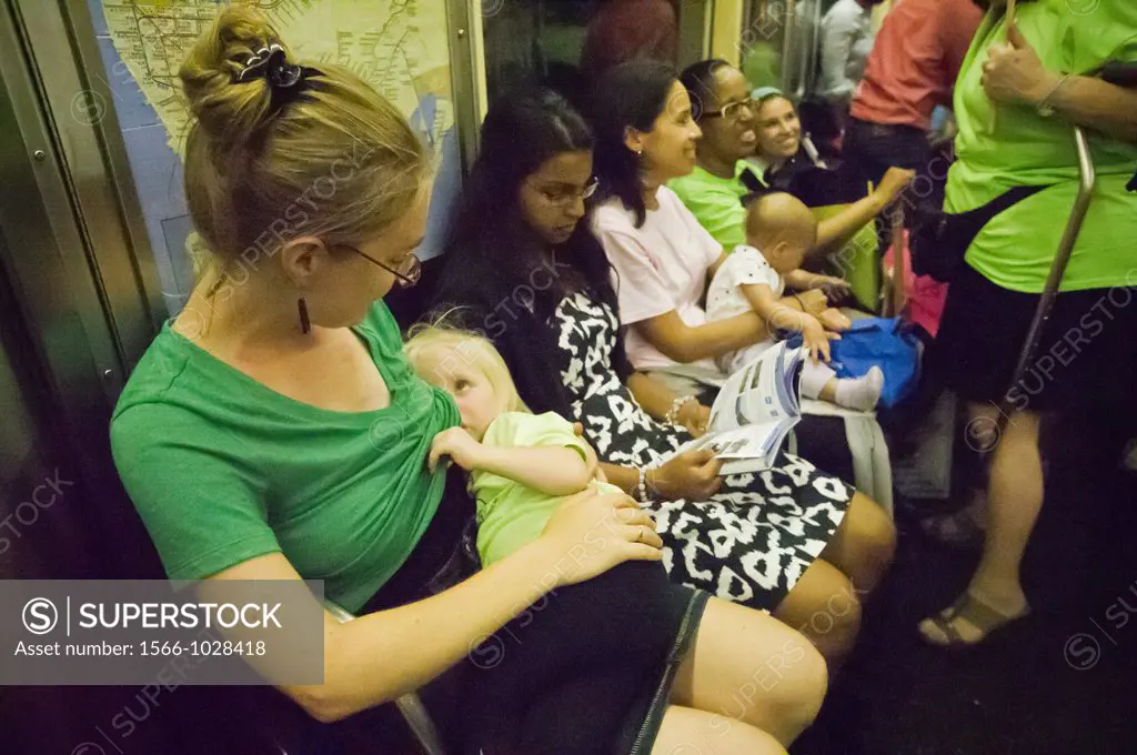 Breastfeeding mothers and their supporters participate in a subway caravan to promote breastfeeding and to celebrate World Breastfeeding Week, In New ...