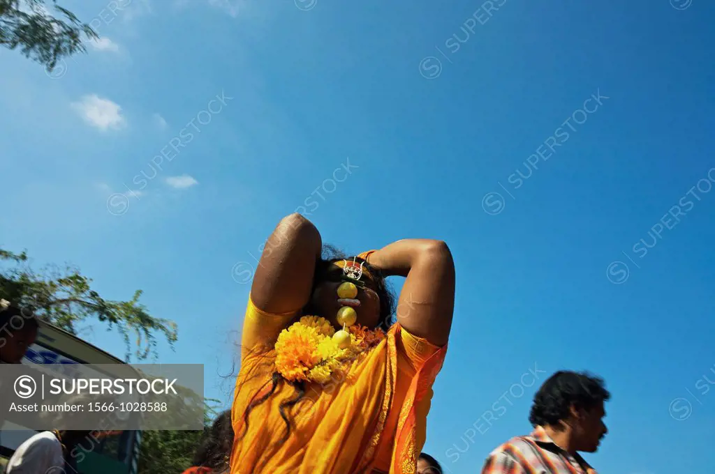 Woman possessed by the goddess Ankalaparamecuvari, who is renowned throughout Tamil Nadu for making her power available to devotees, Mel Malaiyanur te...