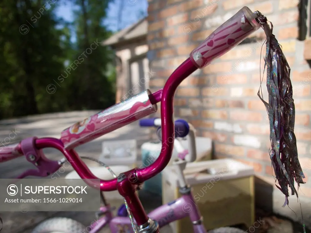 Children´s bikes are left in the backyard of a foreclosed home in Covington, Louisiana, United States